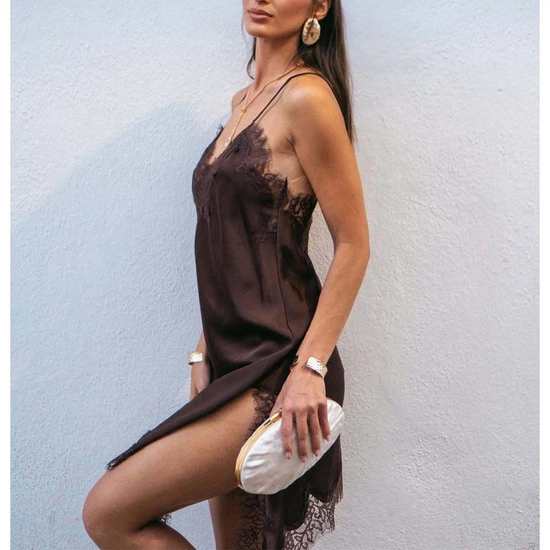 Woman wearing brown satin lace slip dress with asymmetric hem