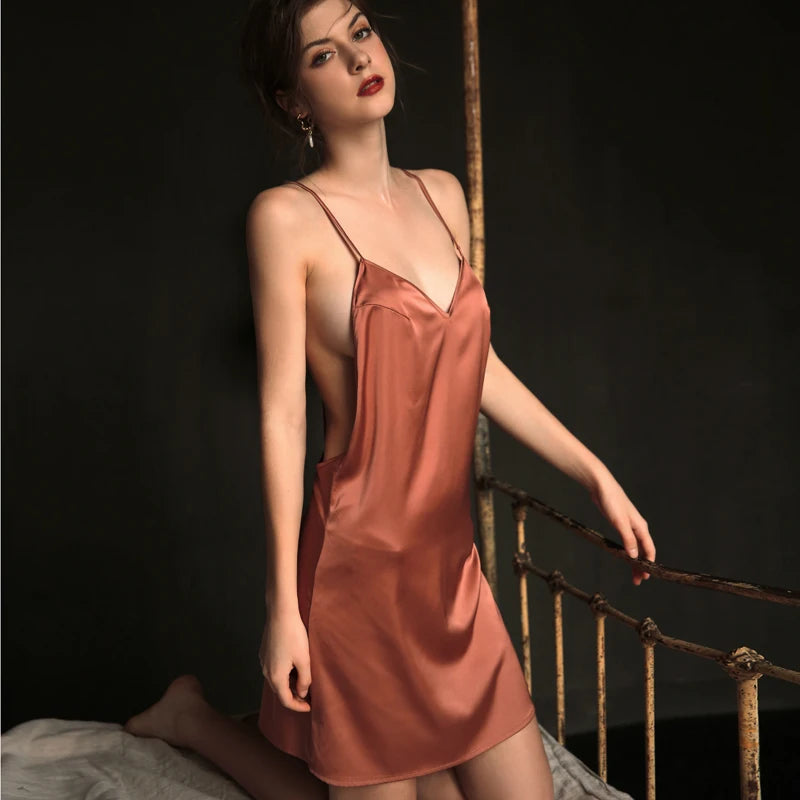 Coral red silk nightdress with deep V neckline and suspender straps